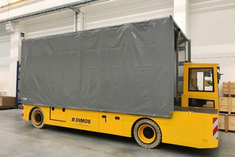 Plattformwagen mit Plane und Kabine in der Seitenansicht von DIMOS